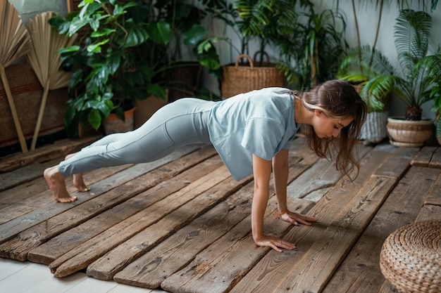 Lifestyle and healthy eating A confident woman does asana exercises