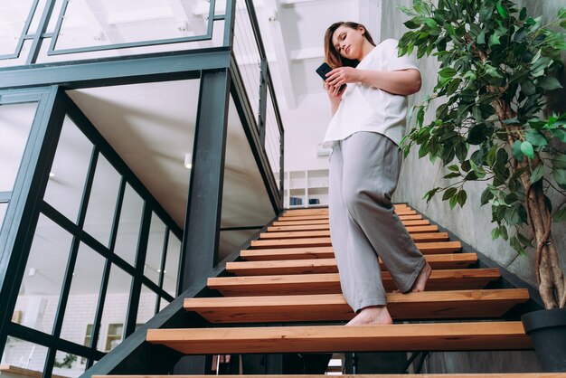 Lifestyle moments of a young woman at home. Woman spending time in the apartment