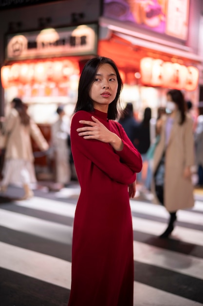 Lifestyle of night in the city with young woman