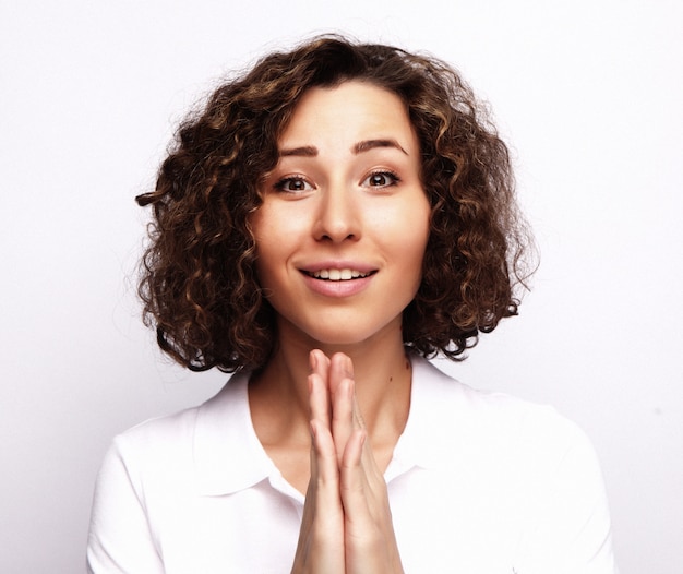 Lifestyle and people concept with Young happy woman with curly hair