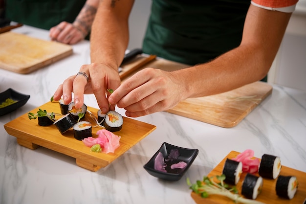 Photo lifestyle of people learning to make sushi