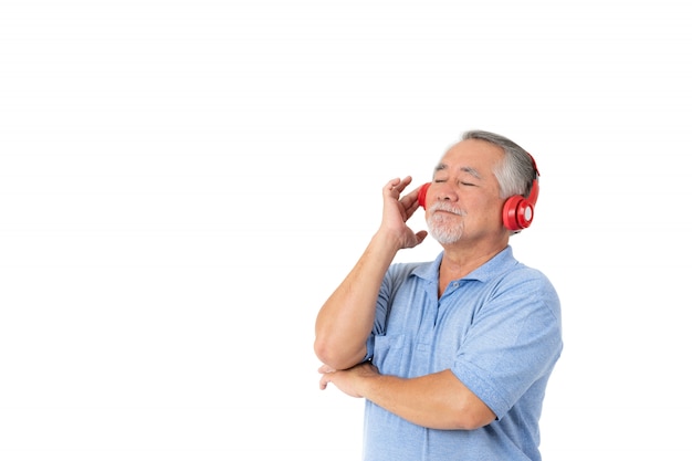 Lifestyle senior man feel happy enjoy listening with earphones headphones on white background