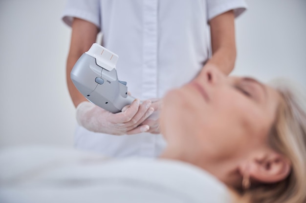 Lifting by ultrasound using a special cosmetology device