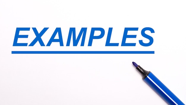 On a light background, an open blue felt-tip pen and the text EXAMPLES