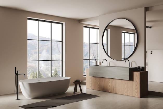 Light bathroom interior with bathtub and sink mirror and panoramic window