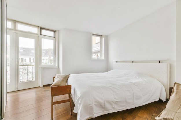 Light bedroom with wooden wardrobe