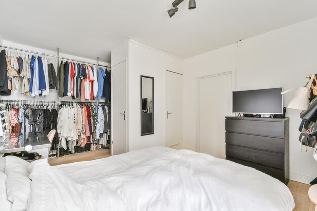 Light bedroom with wooden wardrobe