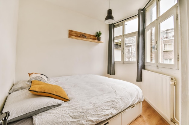 Light bedroom with wooden wardrobe