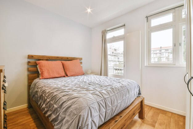 Light bedroom with wooden wardrobe