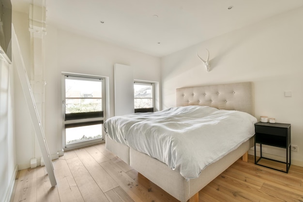 Light bedroom with wooden wardrobe