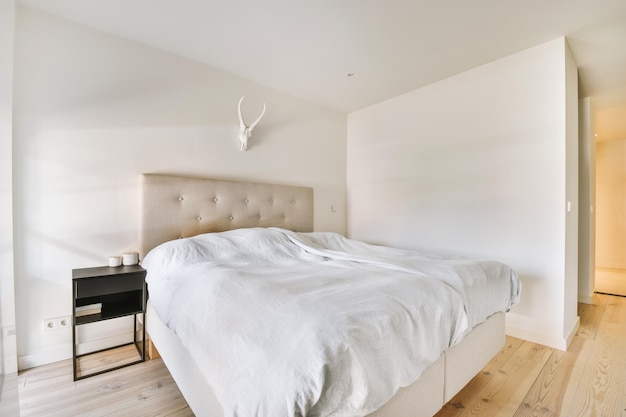 Light bedroom with wooden wardrobe