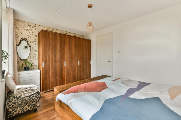 Light bedroom with wooden wardrobe