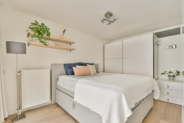 Light bedroom with wooden wardrobe