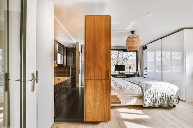 Light bedroom with wooden wardrobe