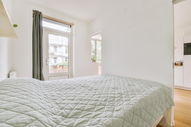 Light bedroom with wooden wardrobe