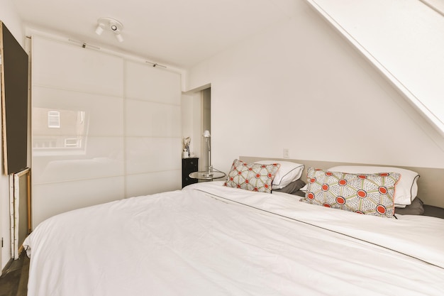 Light bedroom with wooden wardrobe