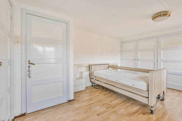 Light bedroom with wooden wardrobe