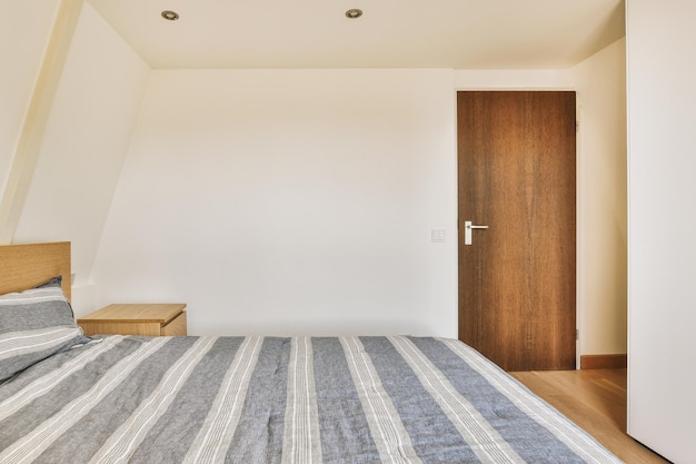 Light bedroom with wooden wardrobe