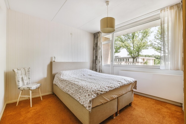 Light bedroom with wooden wardrobe