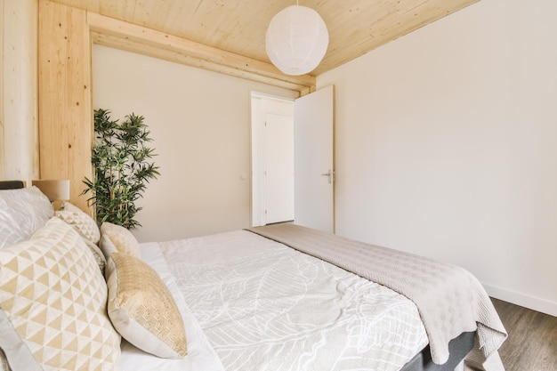 Light bedroom with wooden wardrobe