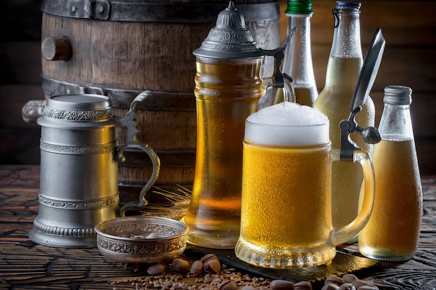 Light beer in a beer glass on an old background.