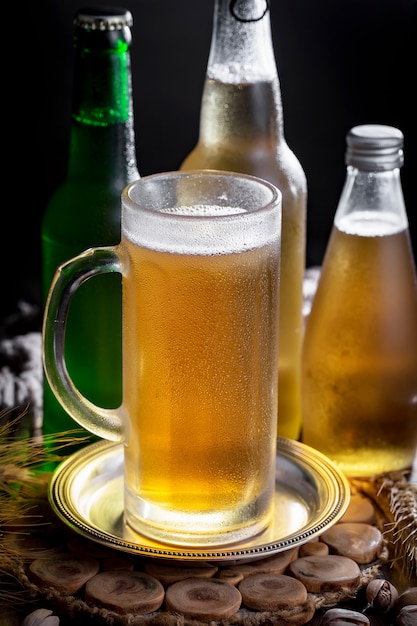 Light beer in a beer glass on an old background.