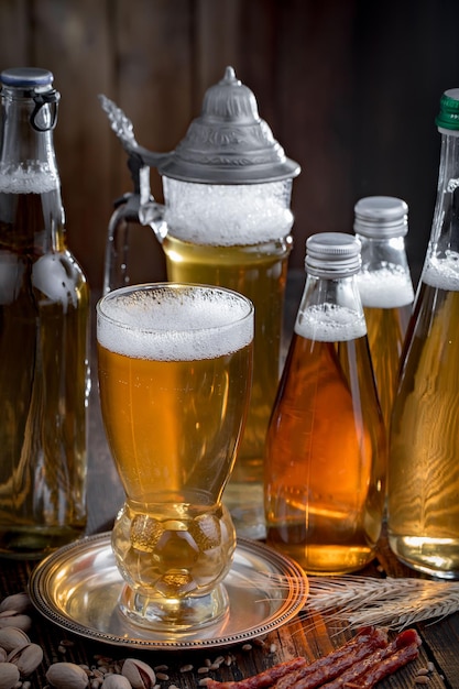 Light beer in a glass on an old background