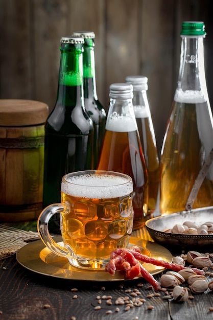 Light beer in a glass on an old background