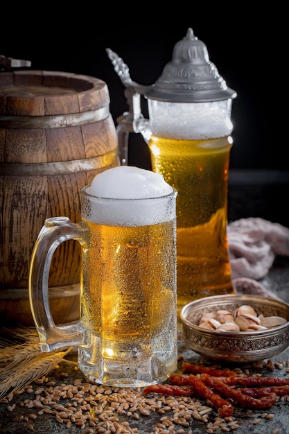 Light beer in a glass on an old background