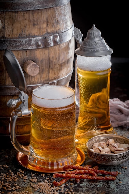 Light beer in a glass on an old background