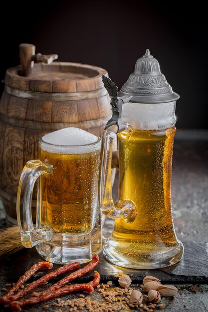 Light beer in a glass on an old background