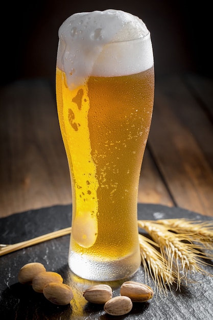 Light beer in a glass on the table