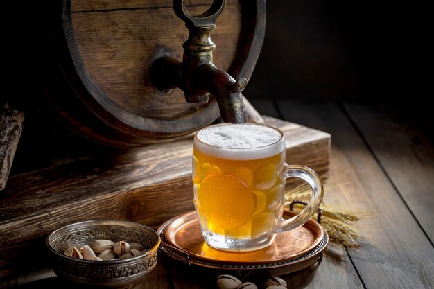 Light beer in a glass on the table