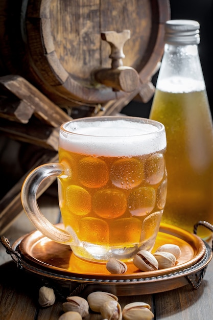 Light beer in a glass on the table