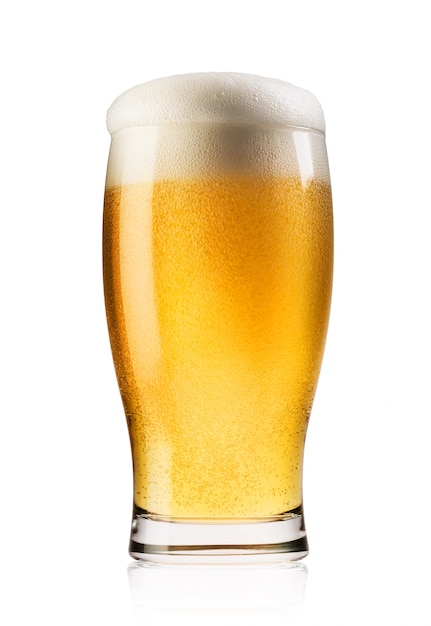 Light beer with the foam poured into glass