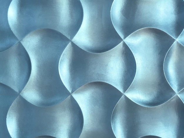 Light blue 3D interior decorative wall panel with unusual wavy geometric shape Pastel background with wave pattern