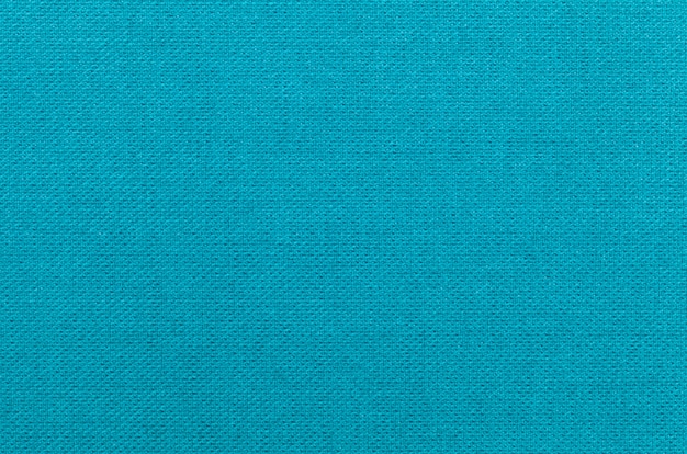 Light blue background from a textile material. 