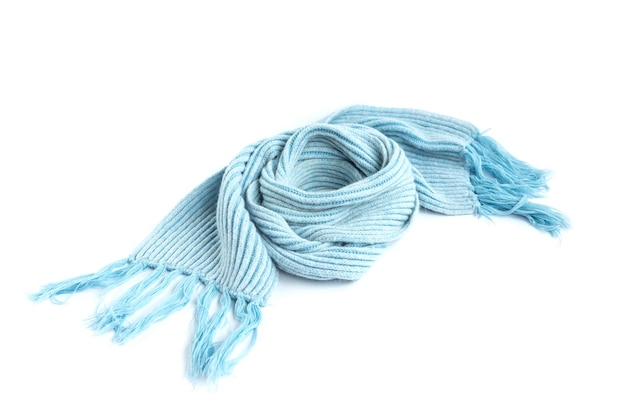 Light blue knitted warm scarf isolated on a white