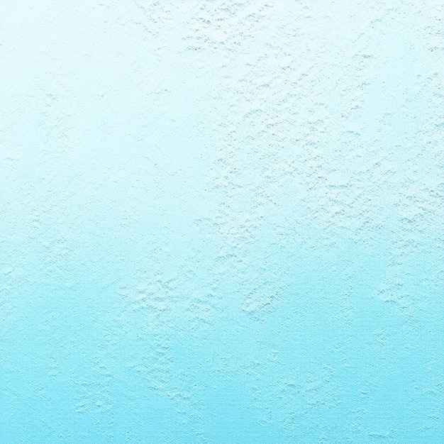 写真 淡い青色の粗い壁の質感の背景