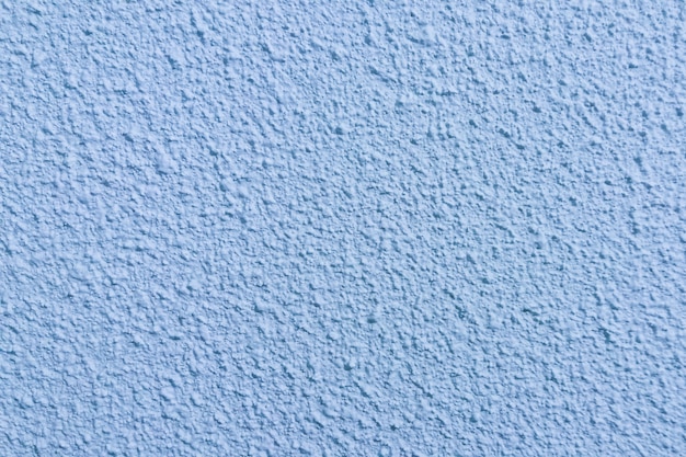 Light blue rugged wall textured background