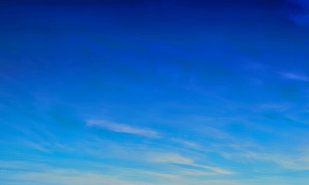 light blue sky with some clouds surface abstract flow thunder white clouds in the blue sky