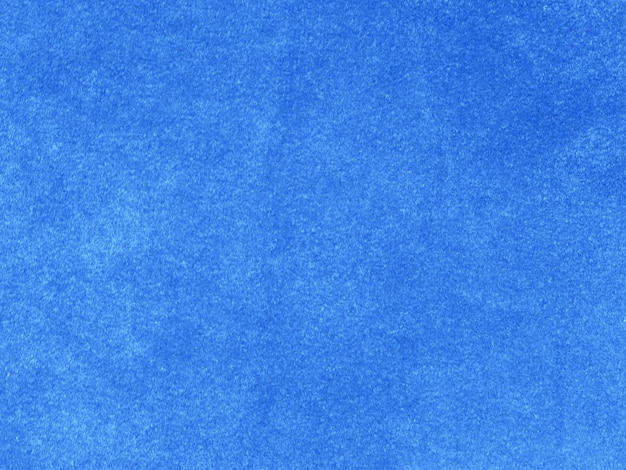 Светло-голубая бархатная текстура ткани, используемая в качестве фона. Пустой светло-голубой фон ткани из мягкого и гладкого текстильного материала. Есть место для текста.