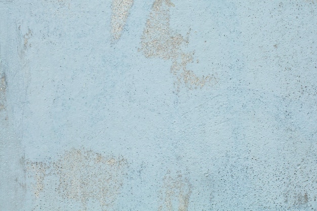 淡い青い風化した壁の質感 古い背景に裂け目がある