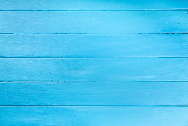 Light blue wooden background