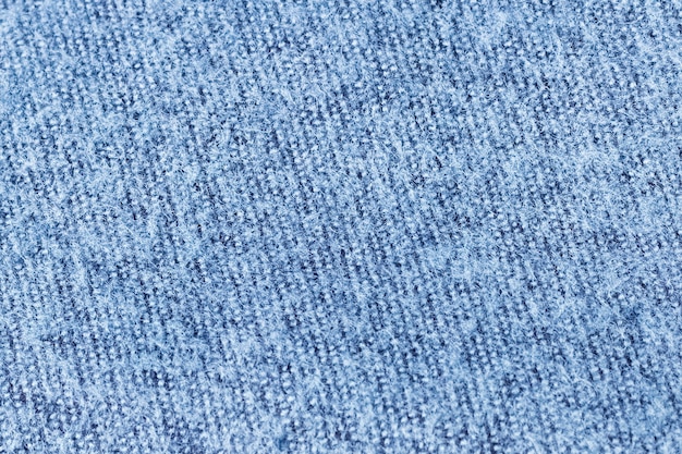 Light blue woolen texture from suede fabric, close up. Background, texture