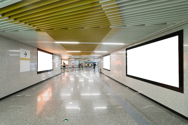 Light box advertising at subway station passageway