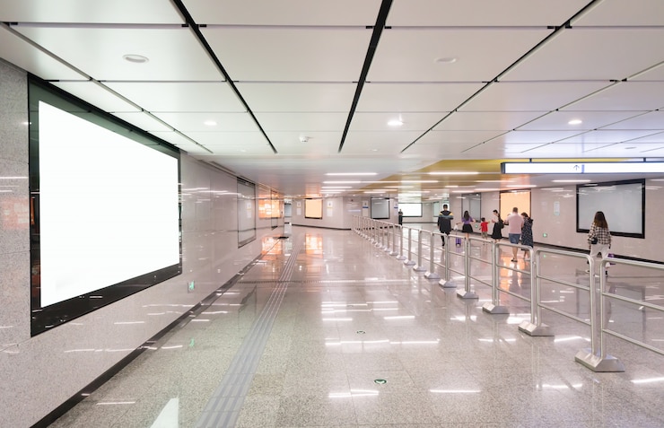 Photo light box advertising at subway station passageway