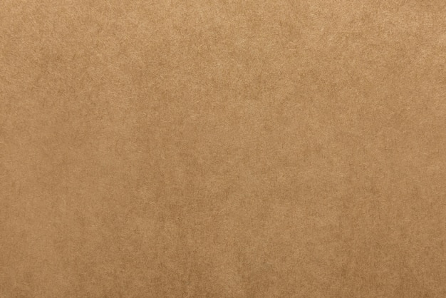 Светло-коричневая текстура крафт-бумаги для фона