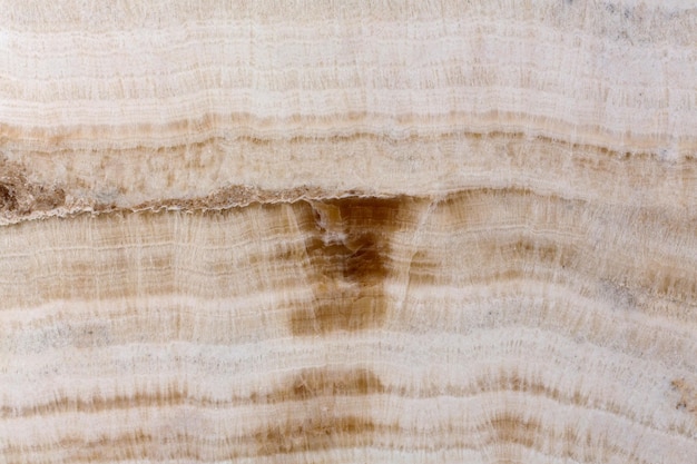 Light brown onyx stone texture on macro