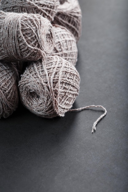 Light brown wool yarn made of threads in tangles. Needlework